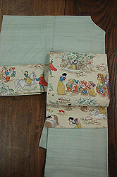 薄緑単衣松本紬に白雪姫名古屋帯