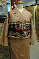 珊瑚色伊兵衛織単衣に浦野理一　海辺模様紬名古屋帯