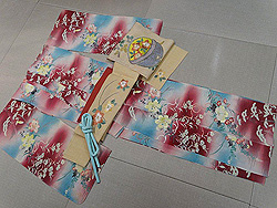 夏秋花模様単衣中振袖に鈴に秋草刺繍単衣帯