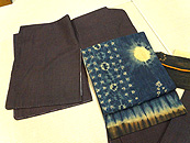 みじん格子本場結城紬にスラウェシ島絞り名古屋帯