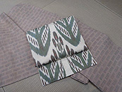 結城紬百亀甲に白地に緑葉模様アドラス名古屋帯