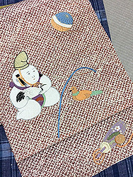 臙脂疋田地に唐子人形刺繍名古屋帯