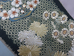 四季の花々丸紋刺繍名古屋帯