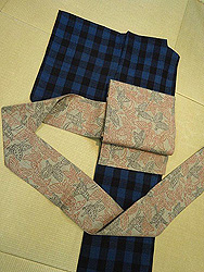 浦野理一格子柄袷に浦野　蝶文様絣名古屋帯