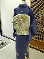 紫カゴに秋草付下に波に汐汲み桶文様袋帯