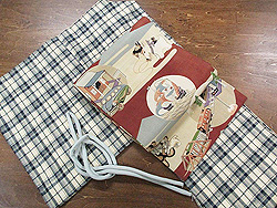 白地に藍格子紬に茶色地おもちゃ尽くし名古屋帯