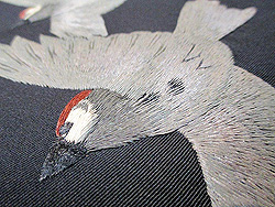 黒地雪に雀刺繍名古屋帯