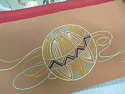 子犬の刺繍名古屋帯