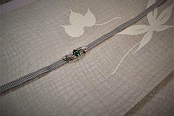 銀鼠色紅葉文様紗名古屋帯