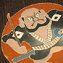 紬地に大津絵張り名古屋帯