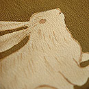 唐花にウサギ縮緬寄裂名古屋帯