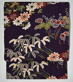 菊花に蘭文様縮緬名古屋帯