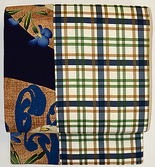 団十郎格子に春の小花の図名古屋帯