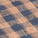 浦野理一作 経節紬小格子名古屋帯　質感・風合