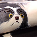 飛び跳ねるチンの名古屋帯 質感・風合