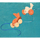 グリーン地おもちゃ尽くし名古屋帯　前中心