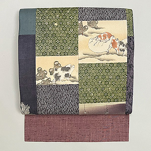 雪中仔犬松梅文様寄せ裂の名古屋帯