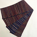 浦野理一作 縦節紬茶色に繋ぎ糸の半巾帯　帯裏