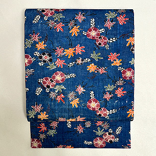 藍木綿地小花文様紅型の名古屋帯