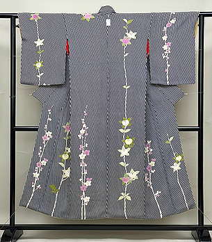 斜線に槍梅と橘の小紋袷