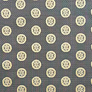 たつむら製「糸屋輪宝文」開き名古屋帯　前柄