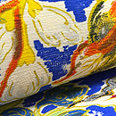 鮮やか色に咲き乱れる花々の染め名古屋帯　質感・風合