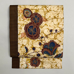 唐花文様刺繍に黄八丈切継ぎ名古屋帯