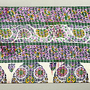 インド更紗ピンク・グリーン勾玉文様名古屋帯　前柄