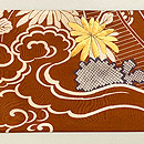 照柿色御簾に菊文様の名古屋帯　前柄