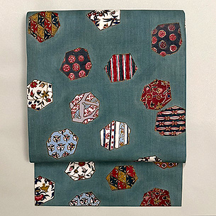 切りばめ文様手描き更紗の名古屋帯