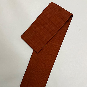 團十郎茶無地紬半幅帯