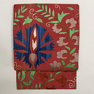 真朱色花唐草スザニの名古屋帯