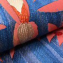 真朱色花唐草スザニの名古屋帯　質感・風合