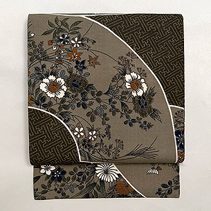 扇面に四季花文様縮緬の名古屋帯