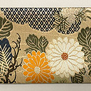 老松に菊桐文様の名古屋帯 前柄