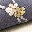 梅と楽器文様刺繍縮緬帯 質感・風合