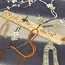 梅と楽器文様刺繍縮緬帯 質感・風合