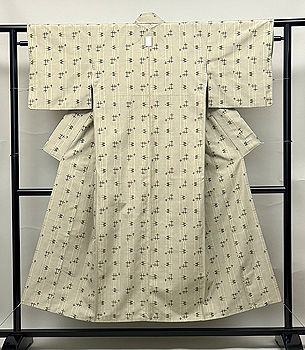 黄緑色の琉球柄の紬