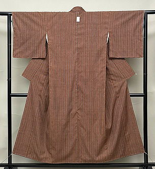 柿渋色と錆鼠色の縞本場結城紬