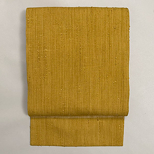 縦節紬辛子色の名古屋帯 浦野理一作