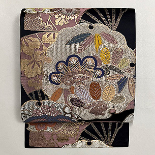 丸帯崩し雪輪に扇面の名古屋帯