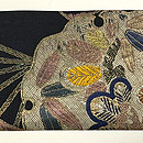 丸帯崩し雪輪に扇面の名古屋帯　前柄