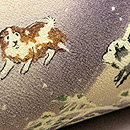 雪中仔犬たちの縮緬地名古屋帯　質感・風合