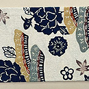 東雲縮緬地柴垣に牡丹の名古屋帯 浦野理一作　前柄