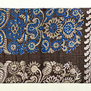 サリー崩し茶タッサーシルクの名古屋帯 前柄