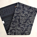 スミ黒の唐花文中型の名古屋帯　帯裏