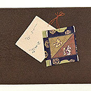 茶地縮緬張込みの名古屋帯　前柄