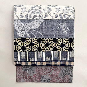 浦野理一の横段継ぎの名古屋帯