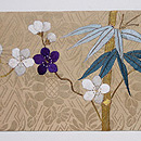 綸子地に梅と竹刺繍名古屋帯　前柄