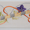 秋の花に雅楽文様刺繍絽縮緬名古屋帯 前柄